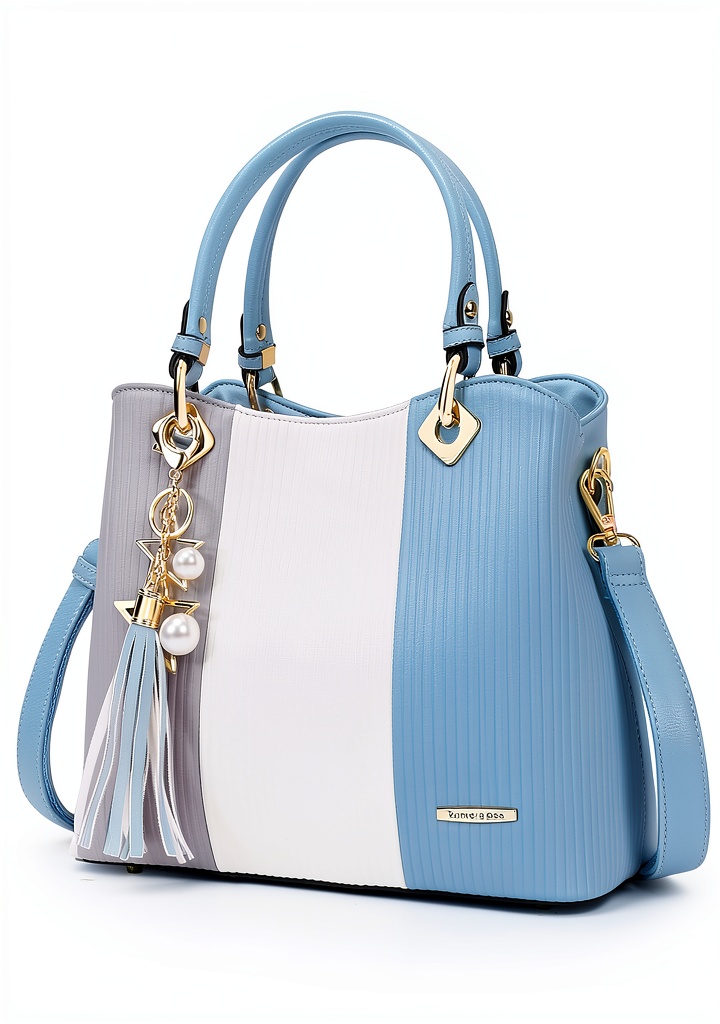 Borsa Pomelo Best a righe multicolore con frange su sfondo neutro